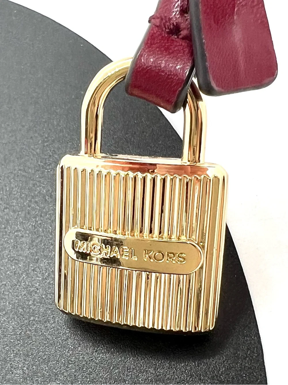 Michael Kors Gold Ribbed Padlock Bag Charm Burgundy Leather Key Ring Bag Charm
